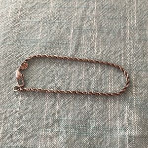 Silver plated twisted rope bracelet . About 8 inches long